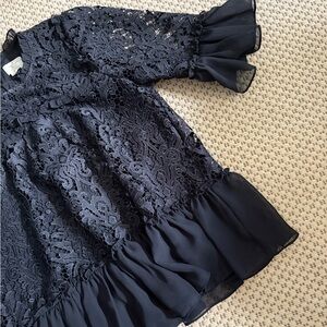 Kate Spade lace top with peplum detail. Size large